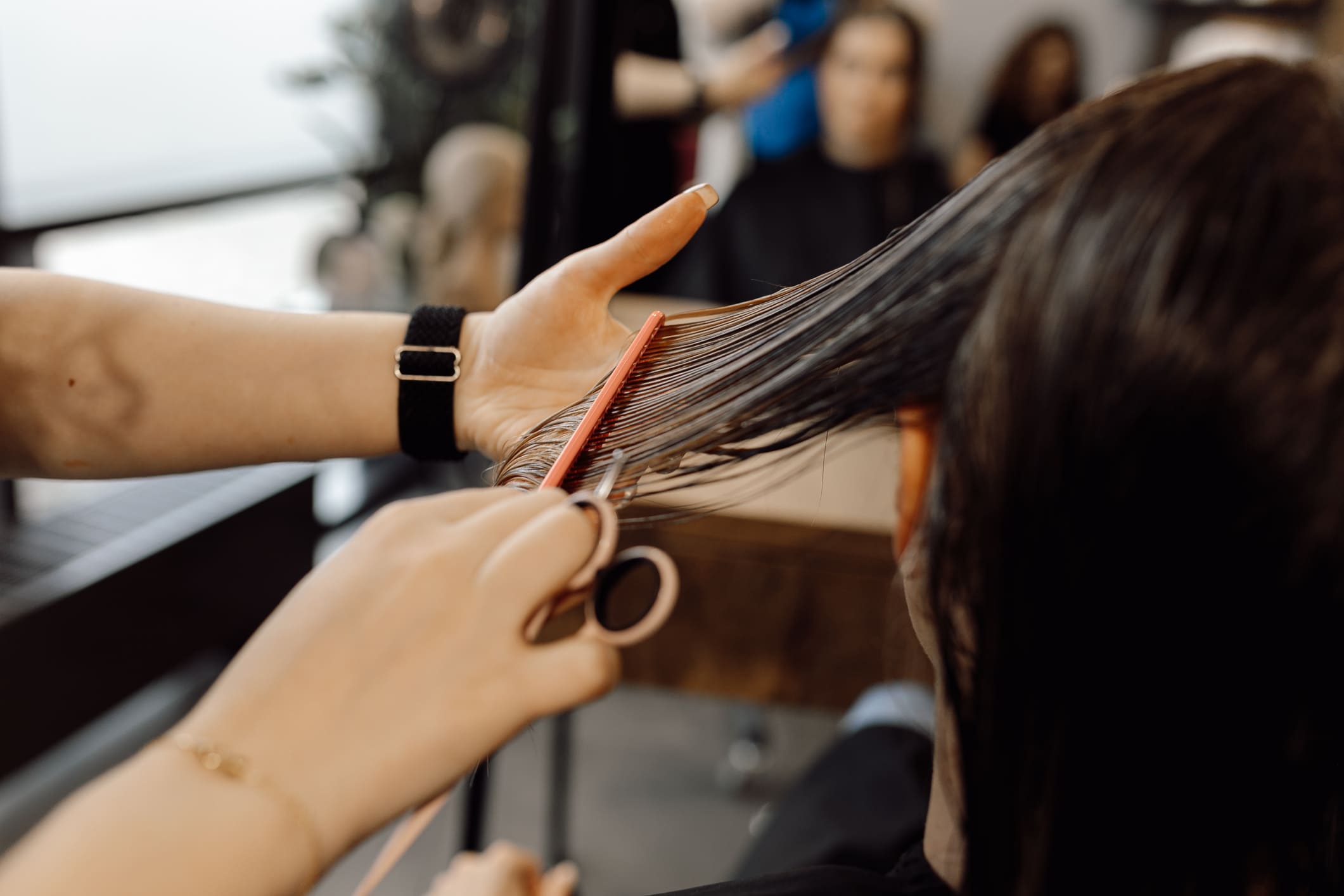 Professional Hairstylist Consulting Client Before Hair Service