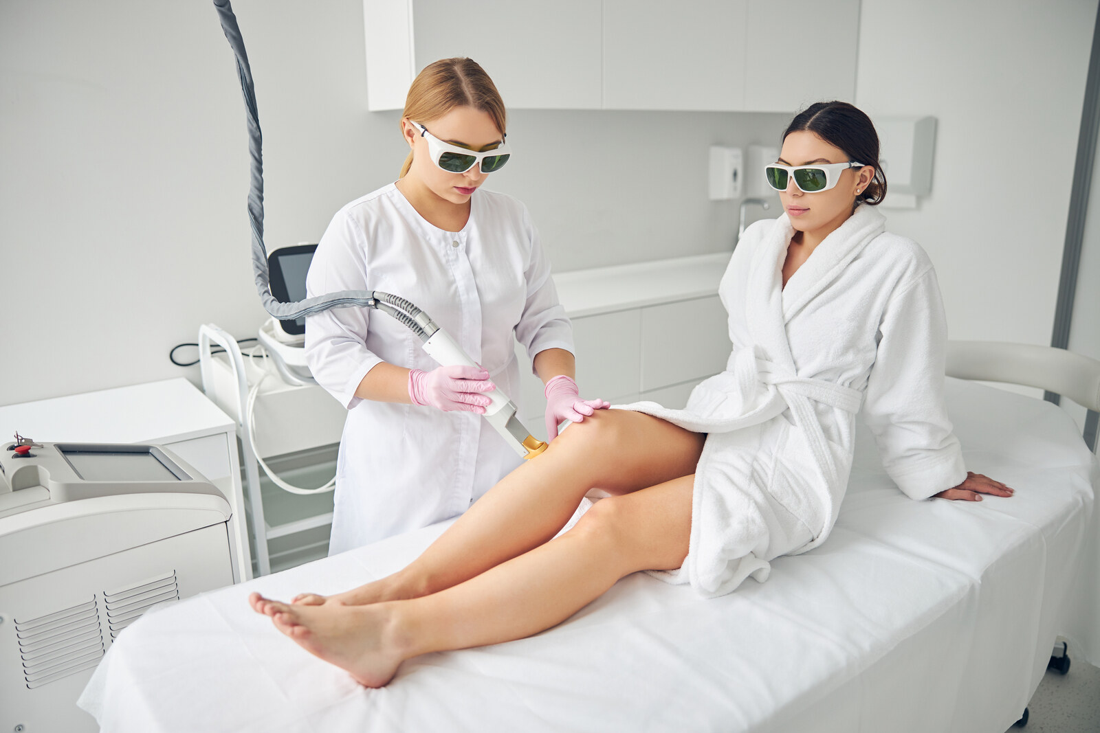 Professional cosmetologist performing the laser hair removal Brazilian Laser Hair Removal in Brampton
